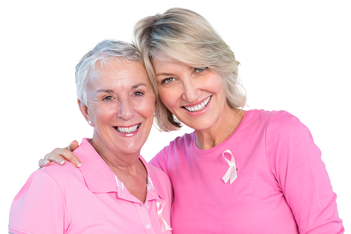 Two smiling women wearing cancer survivor ribbons