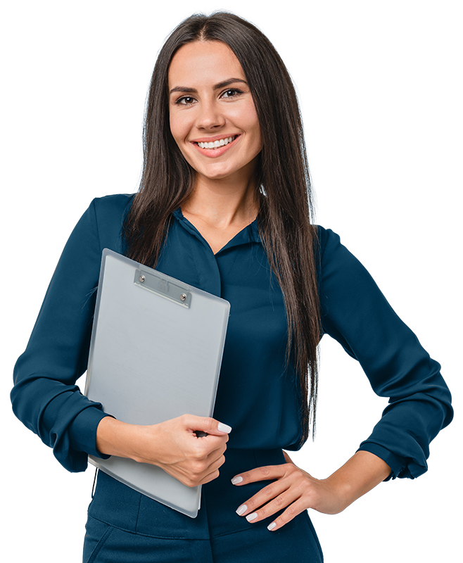 A smiling woman stands casually as she carries a clipboard